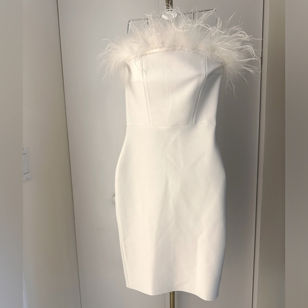 White Bodycon dress with feathers